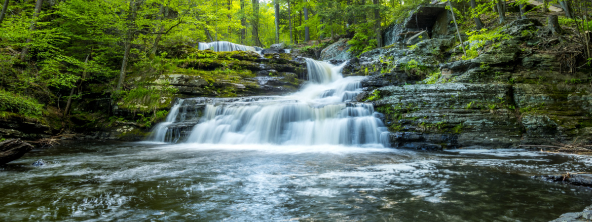 Forest waterfall in Pennsylvania-Shutterstock_643426084